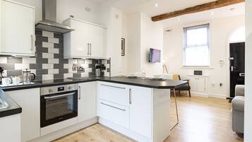 Microwave, toaster, cookware/dishes/utensils