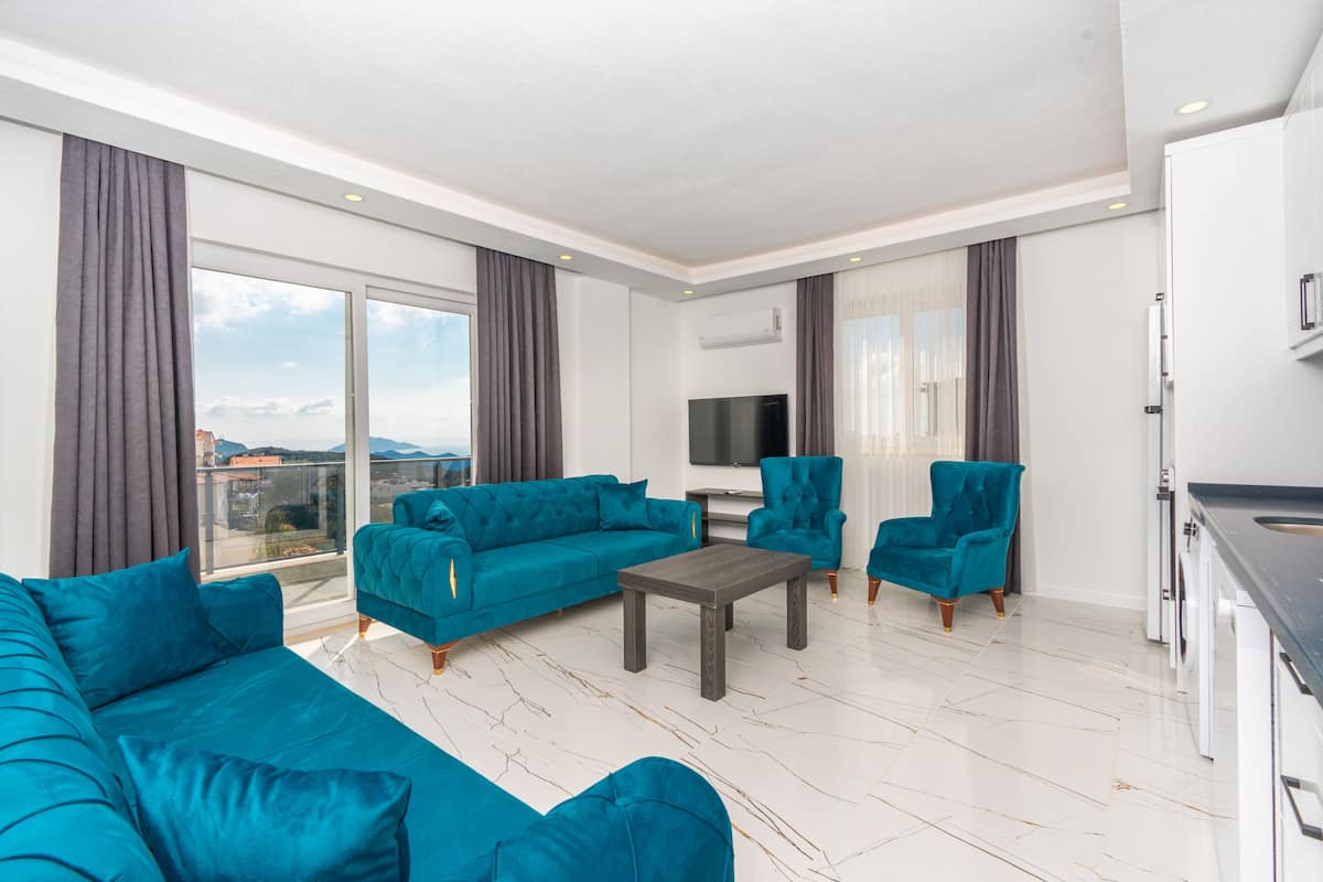 Luxury Apartment | Living area | 50-inch LED TV with digital channels, TV