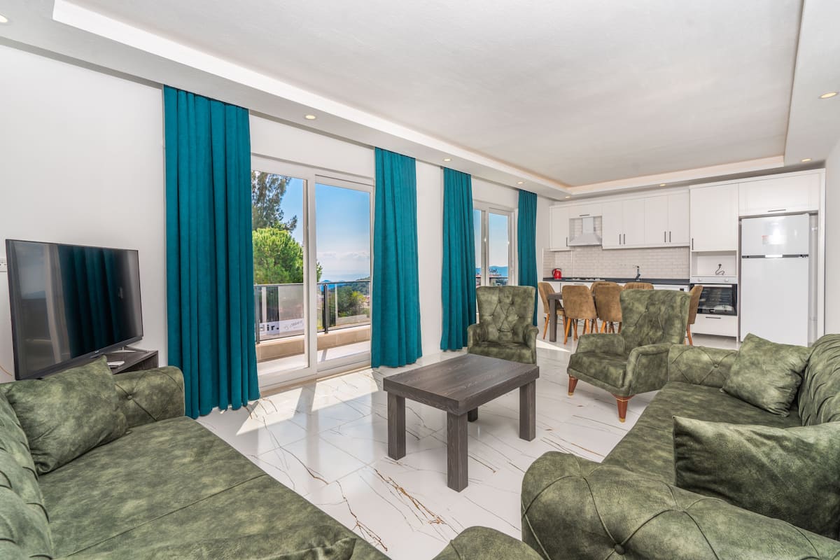 Luxury Apartment | Living area | 50-inch LED TV with digital channels, TV