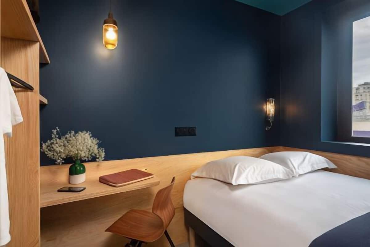 Premium bedding, blackout drapes, soundproofing, iron/ironing board