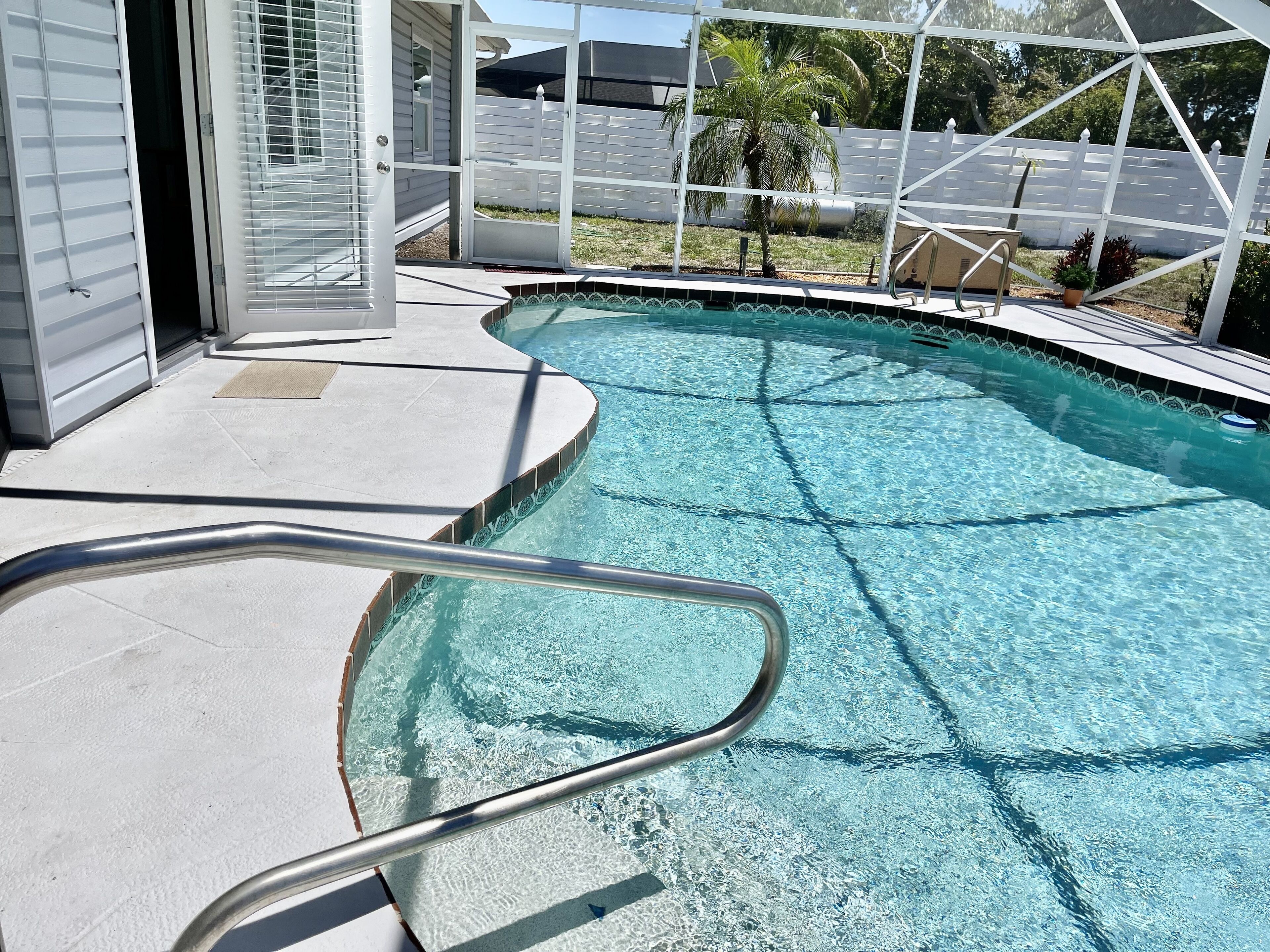 Clean and Bright house with heated pool close to beaches, hiking and golfing