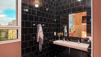 Shower, eco-friendly toiletries, towels, soap