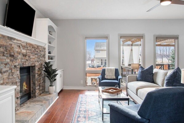 TV, fireplace, offices - Relax in Style! 5BR Home, Hot Tub & Games! (Omaha)