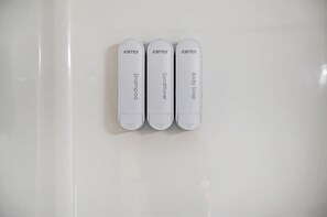 Bathtub, hair dryer, towels