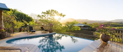Outdoor pool, open 8:00 AM to 9:00 PM, pool umbrellas, pool loungers