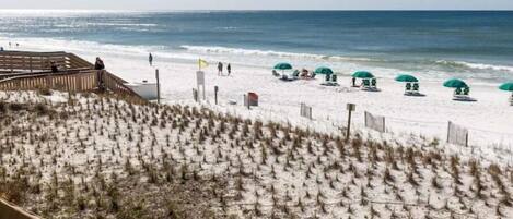 On the beach, sun-loungers