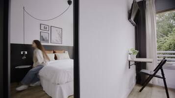 Memory-foam beds, desk, laptop workspace, blackout curtains