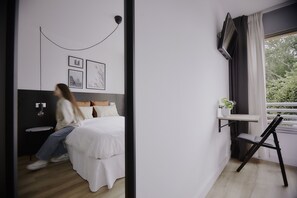 Memory foam beds, desk, laptop workspace, blackout drapes