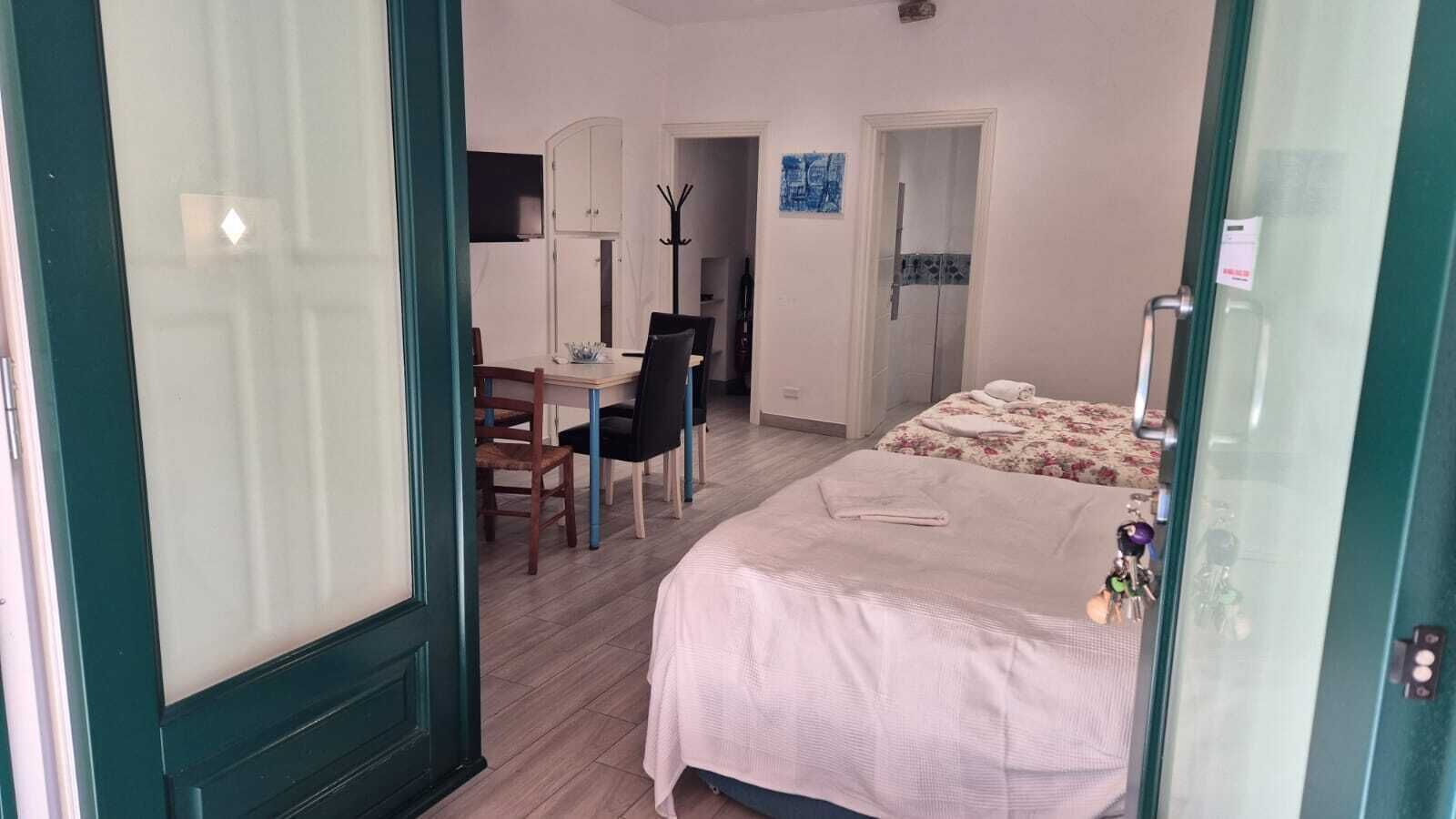 Deluxe Apartment | Living area | 32-inch LED TV with digital channels