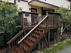 A wooden staircase leading to a porch with a sign indicating 'Villa 27.' - The Beech Club *Mountain Views*Pet Friendly* (Beech Mountain)