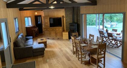 Wooden villa in the heart of nature + heated pool + spa + ocean pools in Soulac
