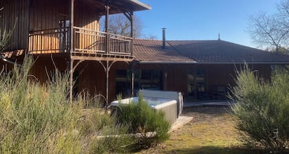 Wooden villa in the heart of nature + spa close to soulac's natural swimming pools