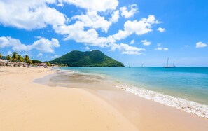 Beach nearby, white sand, beach cabanas, sun loungers