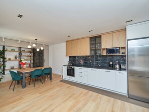 Dishwasher, high chair, dining tables