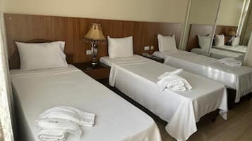 Ropa de cama de alta calidad y minibar