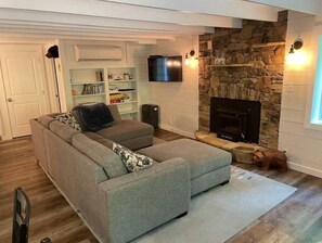 Smart TV, fireplace, DVD player, books