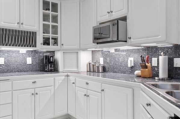 Fridge, microwave, dishwasher, coffee/tea maker