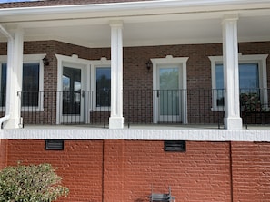 A view of exterior doors from rear deck.