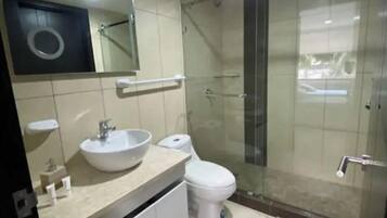 Hair dryer, towels, soap, shampoo