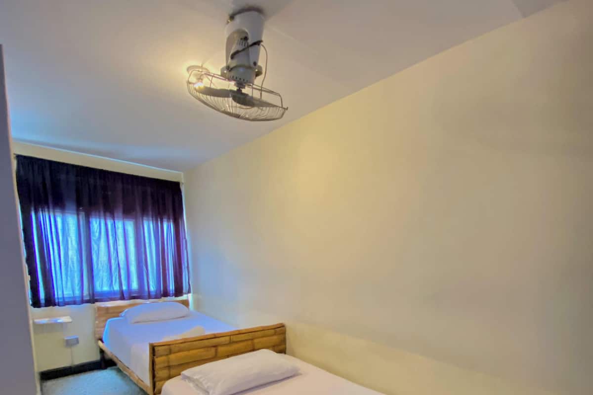 Basic Twin Room | Hypo-allergenic bedding available, blackout drapes, WiFi (free)