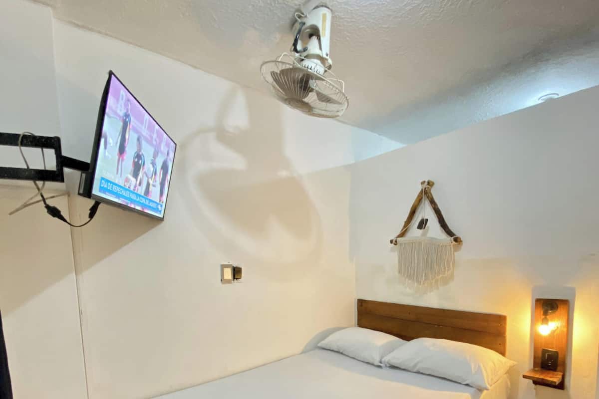 Economy Room | Hypo-allergenic bedding available, blackout drapes, WiFi (free)