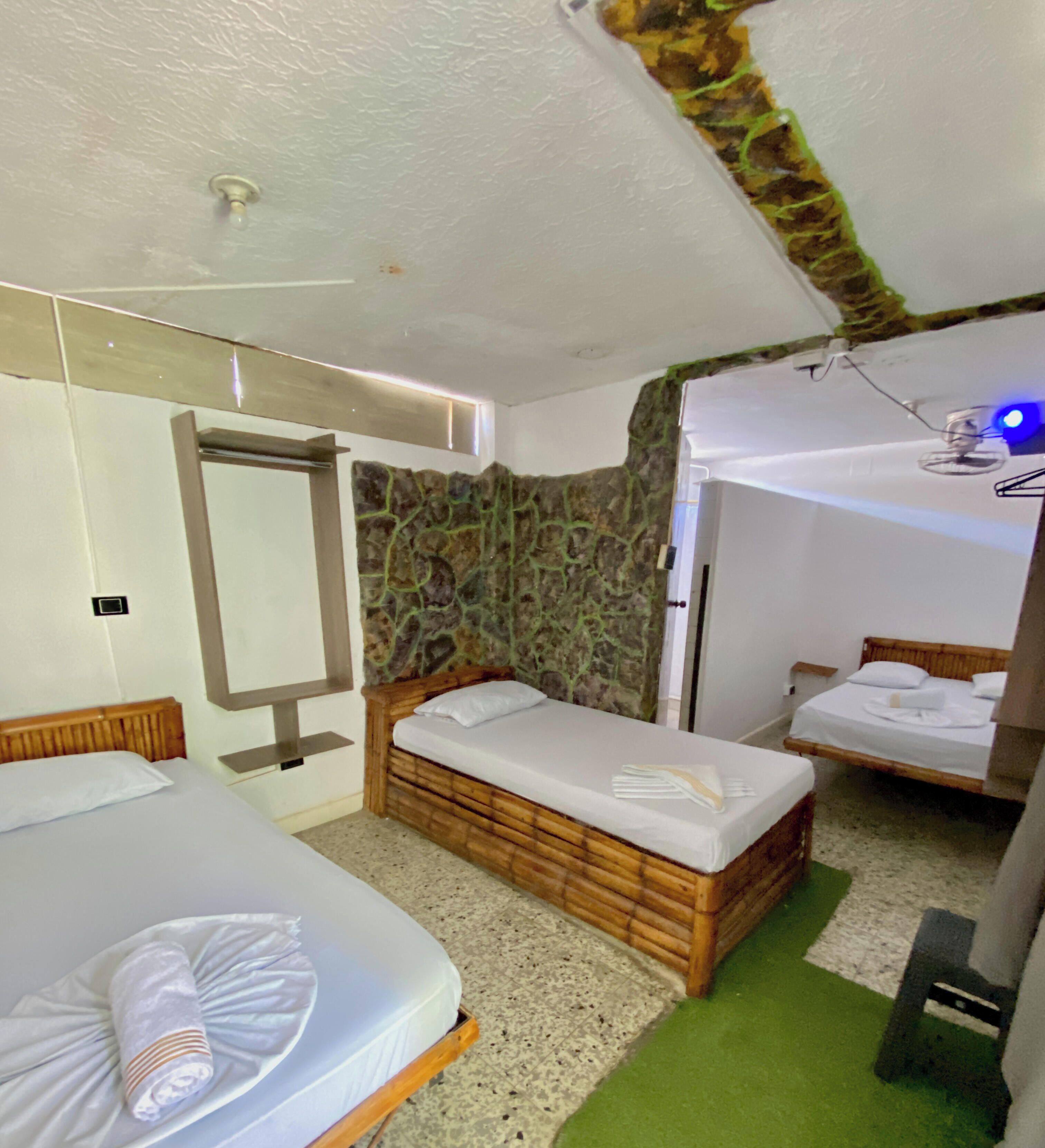 Family Triple Room | Hypo-allergenic bedding available, blackout drapes, WiFi (free)