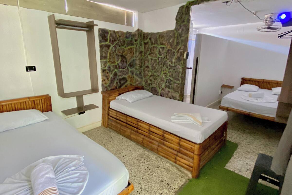 Family Triple Room | Hypo-allergenic bedding available, blackout drapes, WiFi (free)