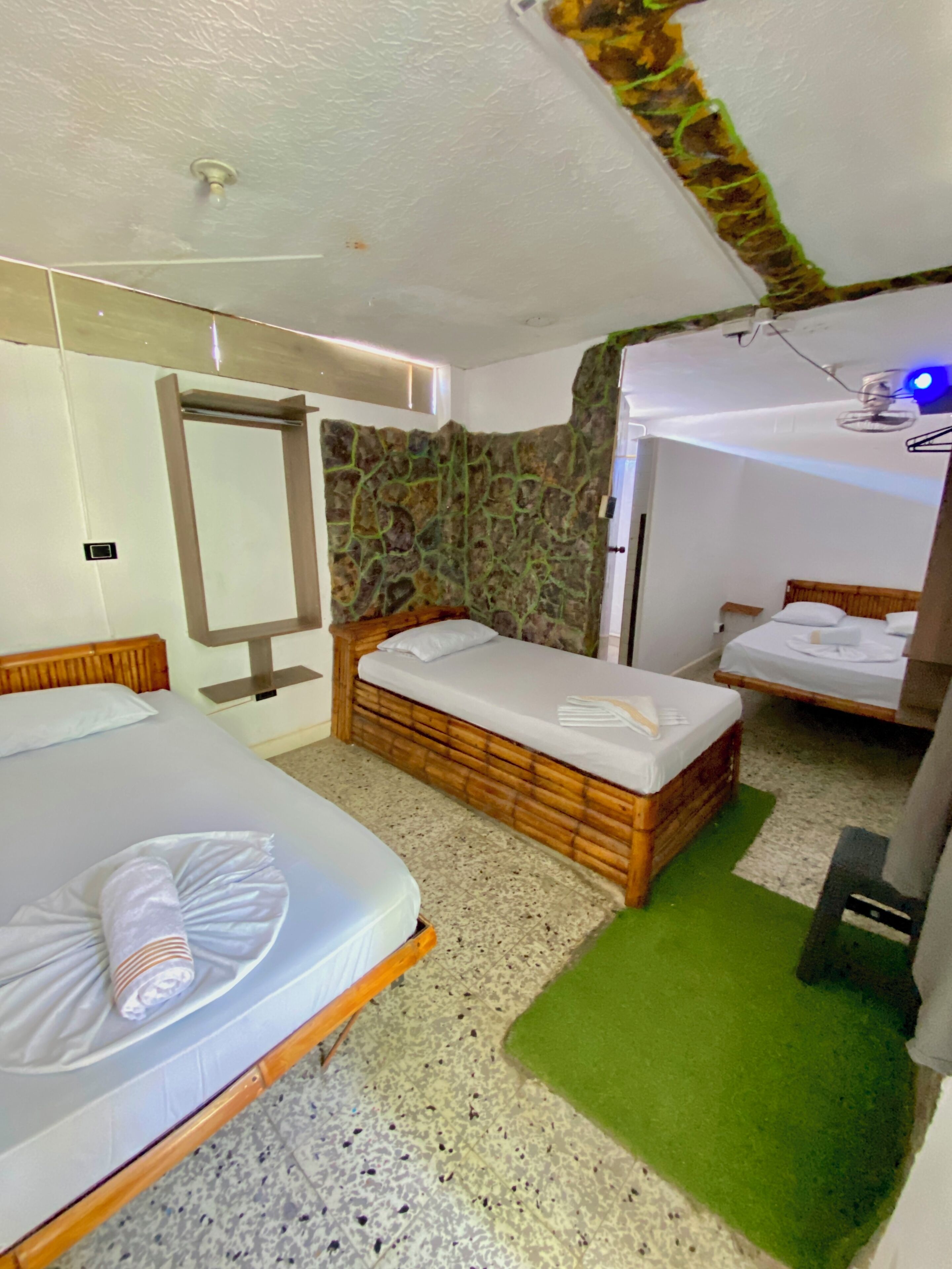 Family Triple Room | Hypo-allergenic bedding, individually decorated, blackout drapes