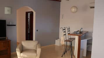 Comfort Apartment | Living area | Flat-screen TV