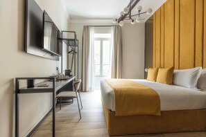Premium bedding, down comforters, pillowtop beds, free minibar
