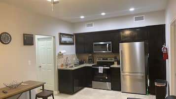 Family House | Private kitchen | Full-size fridge, microwave, oven, stovetop