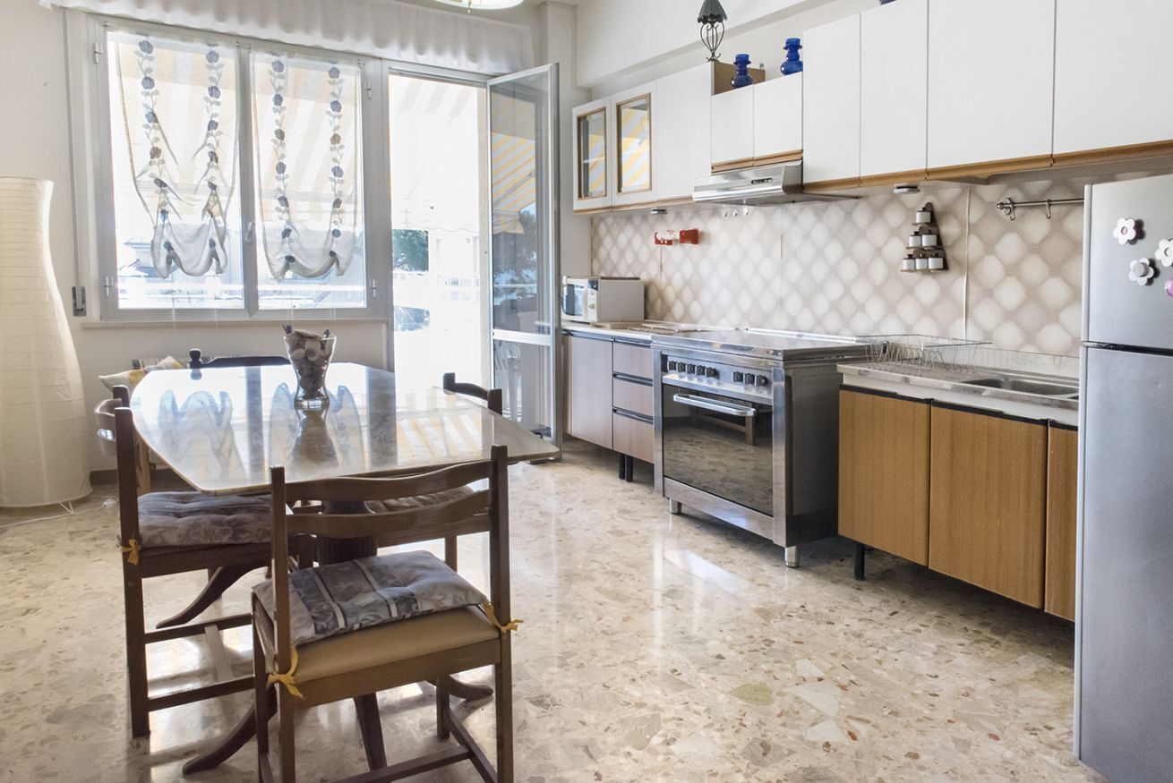 Fridge, oven, dining tables