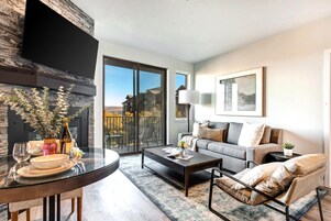 Condo, 2 Bedrooms (MAS-2062) | Living area | 50-inch TV with digital channels