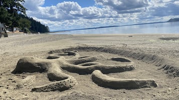 On the beach, sun-loungers, beach towels