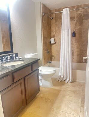 Hair dryer, towels, soap, shampoo