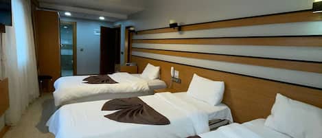 Standard Triple Room | Egyptian cotton sheets, premium bedding, desk, laptop workspace