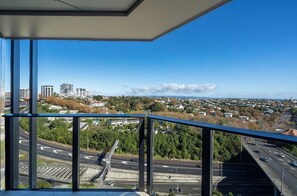 Enjoy unobstructed views of the city from this high-rise building's glass facade.