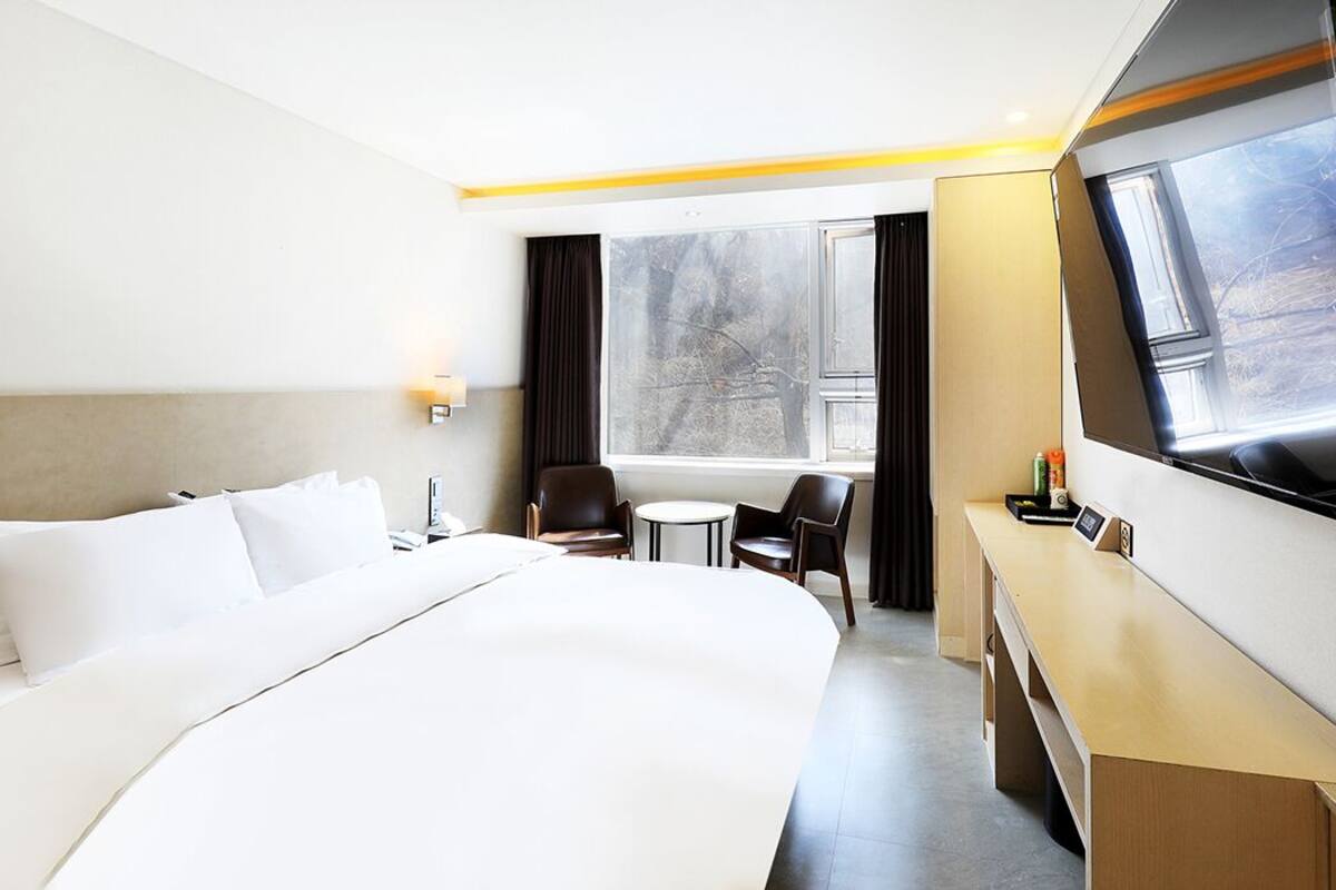 Habitación doble Deluxe | Ropa de cama de alta calidad, edredón y artículos del minibar gratis