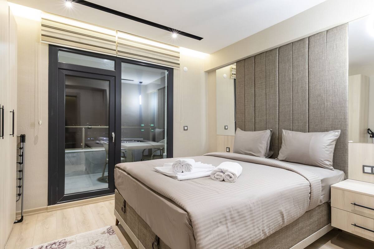 Premium bedding, down comforters, memory foam beds, desk