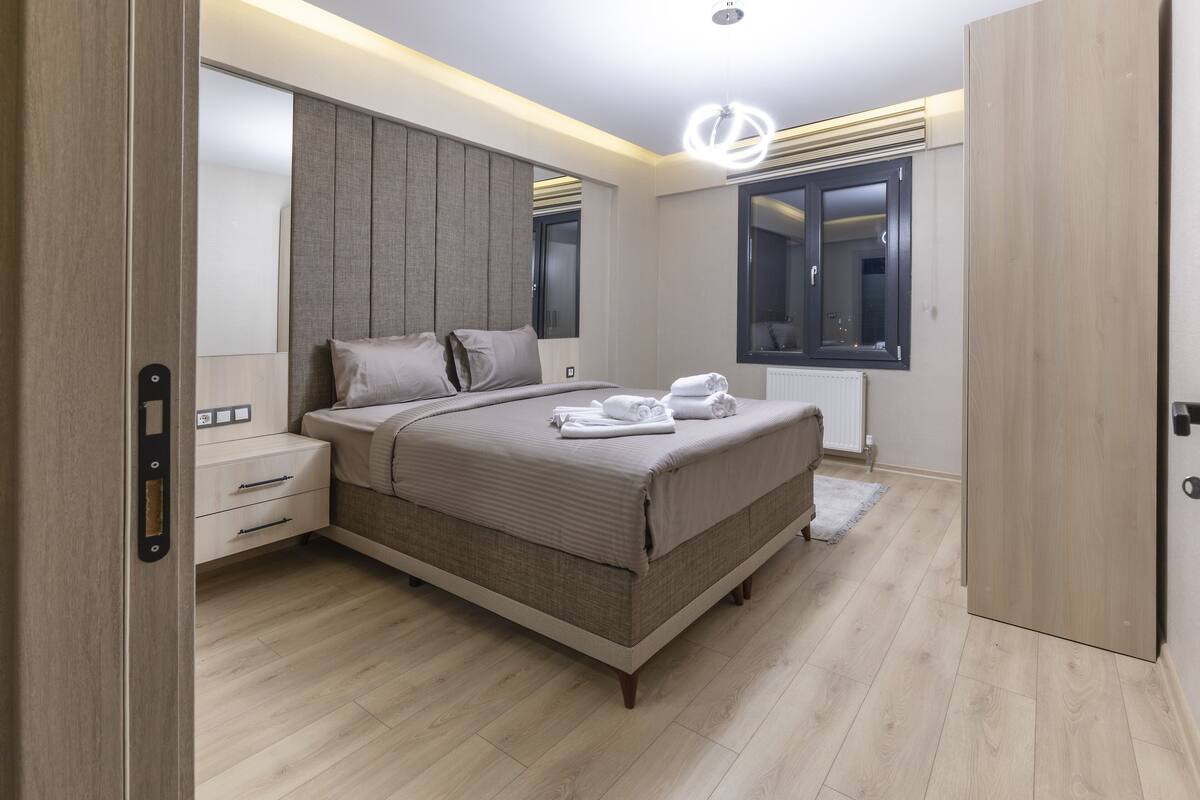 Premium bedding, down comforters, memory foam beds, desk