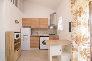 Fridge, microwave, stovetop, cookware/dishes/utensils