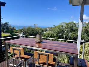 Outdoor dining - Relaxed beach living, with sea views, magical sunsets. 4 min walk to Beach.  (Sunrise Beach)