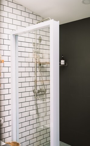 Shower, hair dryer, towels, soap