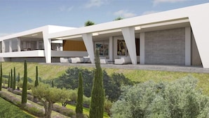 A modern building with a flat roof, large windows, and a covered outdoor seating area. - Eco Dome Crete (Agios Nikolaos)