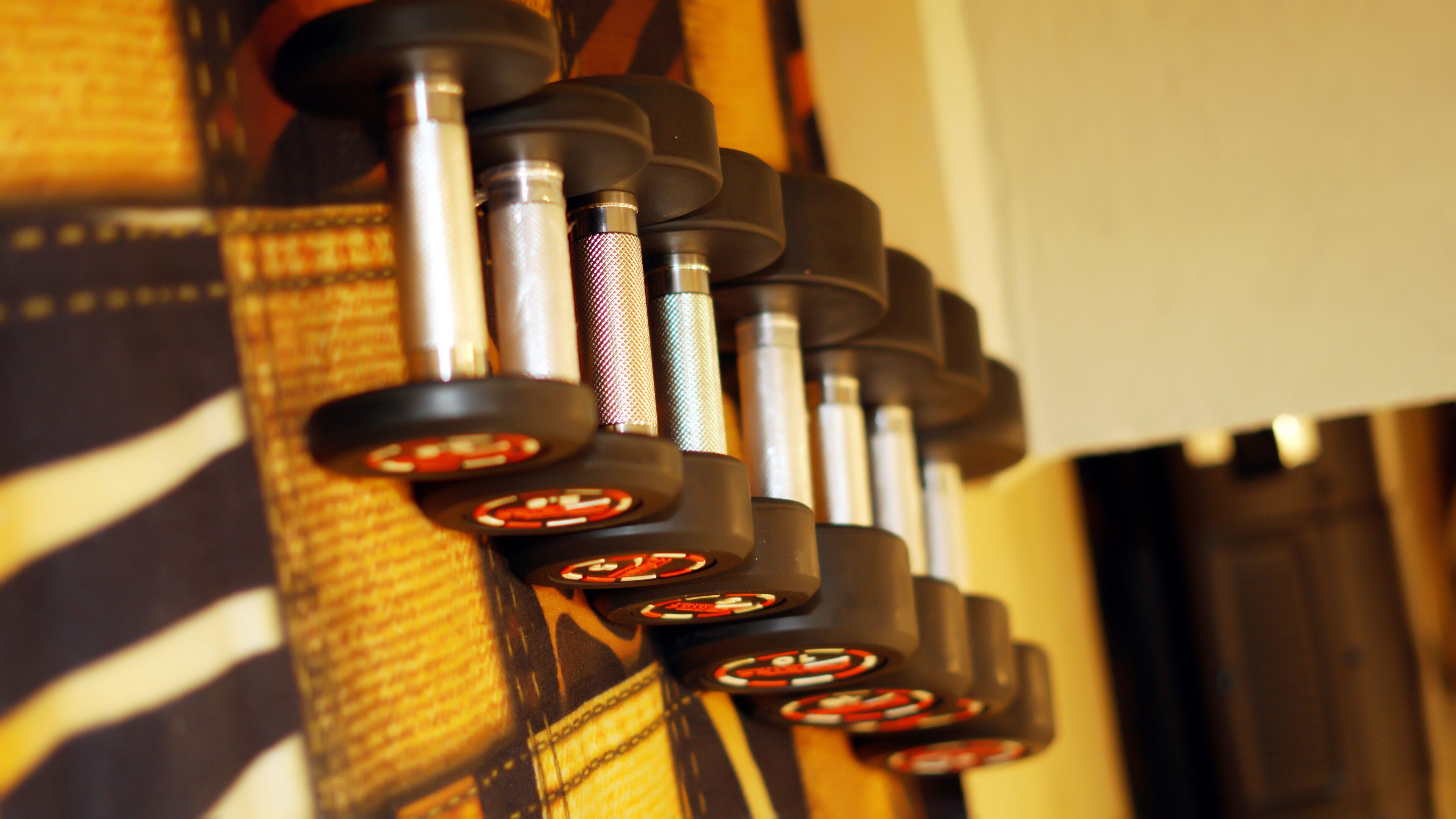 A close-up of poker chips stacked on a table.