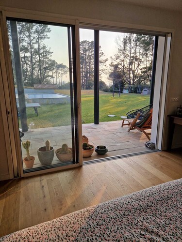 On an exceptional plot of land, recently built house ideally located