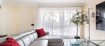 Cheerful 4 bedroom home with parking on premises