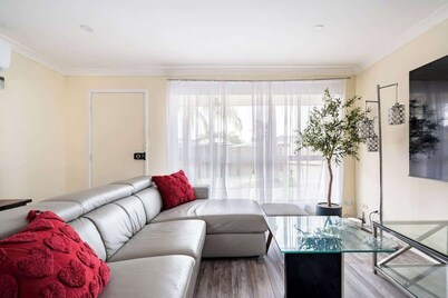 Cheerful 4 bedroom home with parking on premises