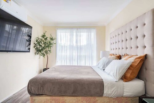 Cheerful 4 bedroom home with parking on premises