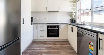 Cheerful 4 bedroom home with parking on premises